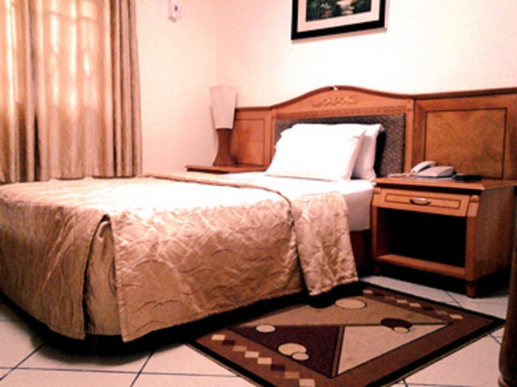 Sunset Hotel Kumasi Phòng bức ảnh