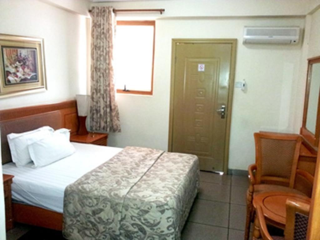 Sunset Hotel Kumasi Phòng bức ảnh